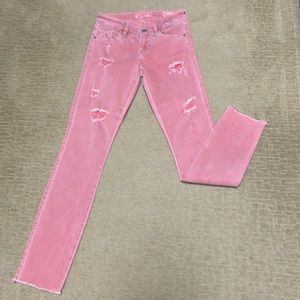 Guess jeans with front distressing. Size 25. Pale pink.